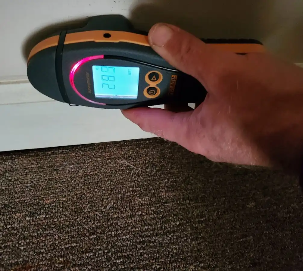 Moisture detection at baseboard during Burst Pipe Cleanup in Oceano